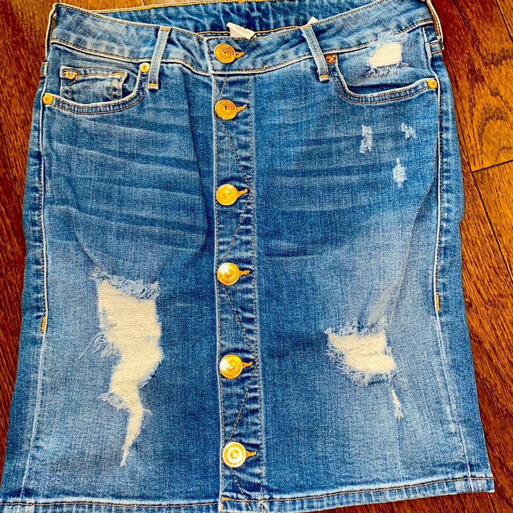 Blue ripped jeans skirt with Gold buttons